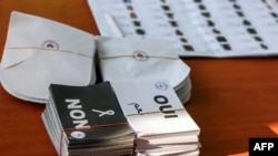 FILE—Ballot papers are seen during the constitutional referendum at a polling station in N'Djamena, on December 17, 2023.