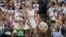 Ukraine's Elina Svitolina celebrates after beating Poland's Iga Swiatek to win their women's singles match at the Wimbledon tennis championships near London, July 11, 2023.