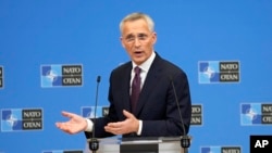 FILE - NATO Secretary-General Jens Stoltenberg speaks during a pre-ministerial media conference at NATO headquarters in Brussels, June 14, 2023.