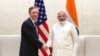 Perdana Menteri India Narendra Modi (kanan) berjabat tangan dengan Penasihat Keamanan Nasional AS Jake Sullivan di New Delhi, 17 Juni 2024. (Perdana Menteri India via AP)