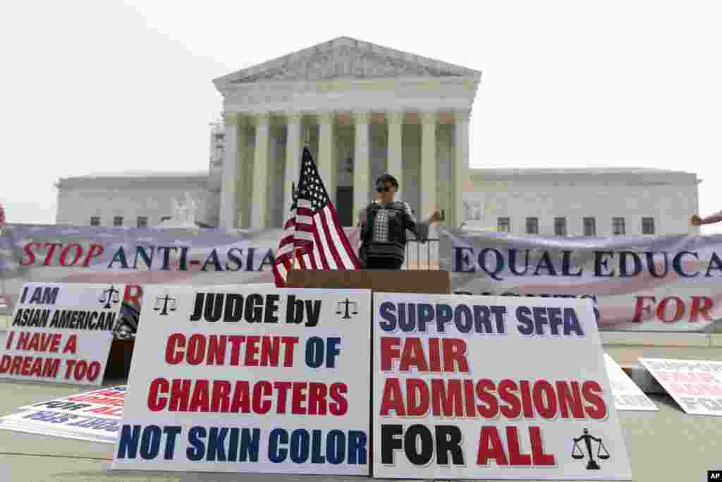 A person protests outside of the Supreme Court in Washington. The Supreme Court struck down affirmative action in college admissions, declaring race cannot be a factor and forcing institutions of higher education to look for new ways to achieve mixed student bodies.&nbsp;