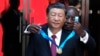 Le président chinois Xi Jinping reçoit l'ordre de l'Afrique du Sud des mains du président Cyril Ramaphosa à Pretoria, le 22 août 2023. (AP / Themba Hadebe)
