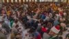 A daily charity iftar inside the historic Al-Azhar Mosque serves around 5,000 meals to Egyptians and international university students, in Cairo, March 29, 2023. (Hamada Elrasam/VOA) 