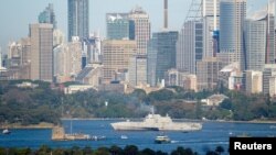 FILE - The USS Canberra arrives in Sydney on July 18, 2023.