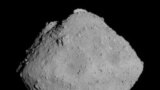 The carbonaceous asteroid Ryugu is seen from a distance of about 12 miles (20 km) during the Japanese Space Agency's Hayabusa2 mission on June 30, 2018.