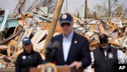 President Joe Biden speaks after surveying the damage in Rolling Fork, Mississippi, March 31, 2023, after a deadly tornado and severe storm moved through the area.