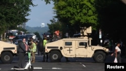 U.S. National Guard block off a street for NATO&#39;s 75th anniversary summit in Washington.