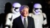 FILE — Harrison Ford arrives at the European Premiere of "Star Wars, The Force Awakens" in London, Dec. 16, 2015. An original draft "Star Wars" script left in a London apartment by Ford, who played Han Solo in the movie, sold at a UK auction for $13,600 on Saturday. 