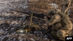 A Ukrainian serviceman takes part in a military training in Ukraine's Donetsk region, Jan. 31, 2024.