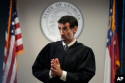 FILE - Fulton County Superior Court Judge Robert McBurney speaks at the Fulton county courthouse, in Atlanta, July 11, 2023.