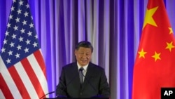 China's President Xi Jinping speaks at a dinner with business leaders during the Asia-Pacific Economic Cooperation summit in San Francisco, California, Nov. 15, 2023.