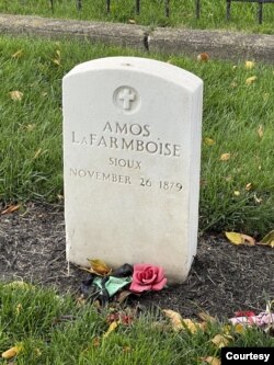 Tombstone of Amos Laframboise, a student at the Carlisle Indian School, Carlisle, Pa. (Cecily Hillary/VOA)