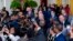 FILE - President Joe Biden greets members of the audience during a reception in recognition of Black History Month in the East Room of the White House in Washington, Feb. 6, 2024. 