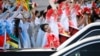 Chinese dancers perform to welcome Mozambique's President Filipe Nyusi as he arrives at Beijing Capital Airport, ahead of the Forum on China-Africa Cooperation (FOCAC), Sept. 2, 2024.