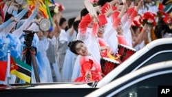 Chinese dancers perform to welcome Mozambique's President Filipe Nyusi as he arrives at Beijing Capital Airport, ahead of the Forum on China-Africa Cooperation (FOCAC), Sept. 2, 2024.