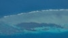 FILE - An aerial view shows the BRP Sierra Madre on the contested Second Thomas Shoal, locally known as Ayungin, in the South China Sea, March 9, 2023.