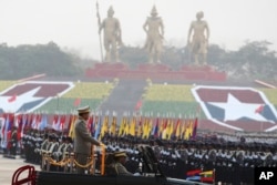 Senior Gen. Min Aung Hlaing, head of the military council, inspects officers during a parade to commemorate Myanmar's 78th Armed Forces Day in Naypyitaw on March 27, 2023. (Aung Shine Oo/AP)