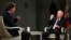 FILE - In this photo released by Sputnik news agency, Feb. 9, 2024, U.S. commentator Tucker Carlson interviews Russian President Vladimir Putin in Moscow on Feb. 6, 2024. Part of the interview was used to create a history quiz that Russian school children took this month.