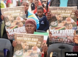 People gather to see former boxing champion Floyd Mayweather Jr. at a rally in Mabvuku, a high-density suburb in Harare, Zimbabwe, July 13, 2023.