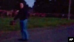 This image from video released July 19, 2023, appears to show Russian mercenary chief Yevgeny Prigozhin for the first time since he led a short-lived rebellion in June. The grainy video purportedly shows him speaking to troops, in Belarus.