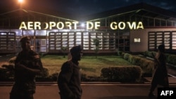 FILE - Kenyan and Congolese soldiers stand at Goma airport, Democratic Republic of Congo on December 3, 2023. 