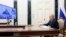 Russian President Vladimir Putin chairs a meeting on the social and economic development of Crimea and Sevastopol via a videoconference at the Moscow's Kremlin in Moscow, March 17, 2023. (Mikhail Metzel, Sputnik, Kremlin Pool Photo via AP)