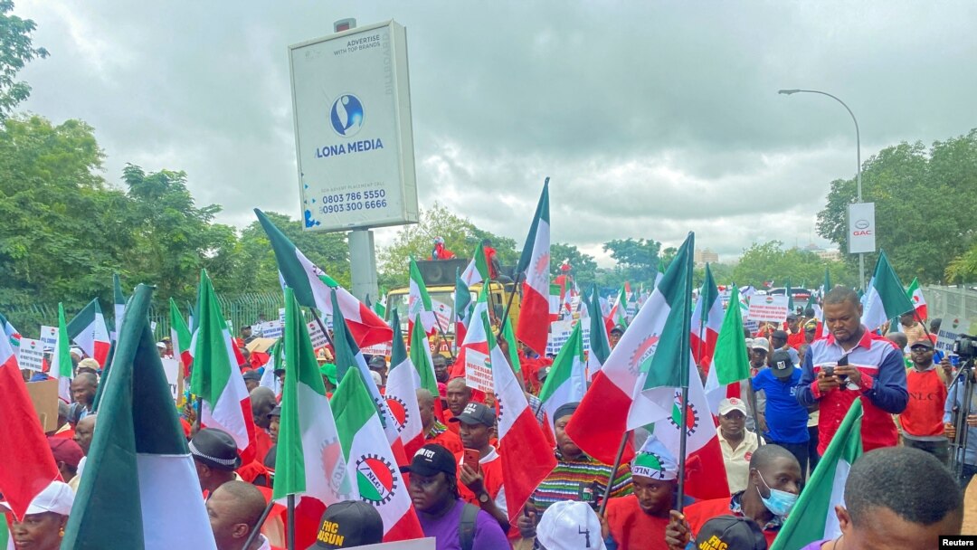 FILE - Members of the Nigerian Labour Union protest against fuel price hikes and rising costs in Abuja, Nigeria, Aug. 2, 2023. 