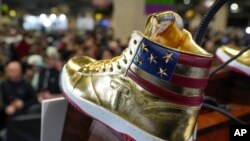 Election 2024 Trump/gold Trump sneakers (AP)