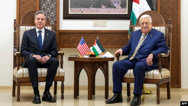U.S. Secretary of State Antony Blinken, left, meets with Palestinian President Mahmoud Abbas in Ramallah, in the occupied West Bank, Feb. 7, 2024.