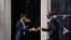 Britain's Prime Minister Rishi Sunak (L) welcomes Rwanda's President Paul Kagame, in Downing Street, cental London, on May 4, 2023 ahead of a meeting.
