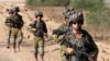 Israeli soldiers patrol along Israel's southern border with the Gaza Strip on June 13, 2024, amid the ongoing conflict between Israel and Hamas.