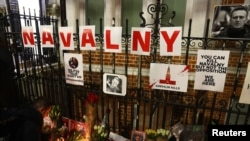 A makeshift memorial outside the Russian Embassy in London honors Russian opposition leader Alexey Navalny after reports of his death, Feb. 16, 2024.