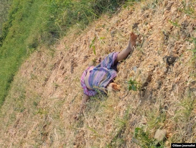 The dead body of a woman in the village of Nyaung Yin, Myinmu township.