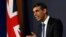 FILE - Prime Minister Rishi Sunak speaks during a press conference following the launch of new legislation on migrant channel crossings at Downing Street on March 7, 2023 in London, United Kingdom. 