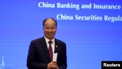時任中國證監會主席易會滿在上海出席陸家嘴金融論壇。 （2019年6月13日）