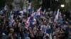 Anti-government protesters rally in the center of Tbilisi, Georgia, April 9, 2023. the Black Sea nation's leaders face mounting accusations of backsliding on democracy. 