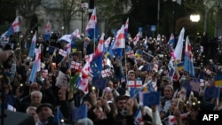 Anti-government protesters rally in the center of Tbilisi, Georgia, April 9, 2023. the Black Sea nation's leaders face mounting accusations of backsliding on democracy. 