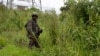 FILE - An M23 rebel looks on in Kibumba in eastern Democratic Republic of the Congo, Dec. 23, 2022. The military spokesman for the Rwandan-backed M23 rebel group has been sanctioned by the U.N. Security Council. 