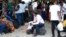 Haitians waiting to board a flight to Nicaragua gather after the government banned all charter flights to Nicaragua, at Toussaint Louverture International Airport in Port-au-Prince, Haiti, Oct. 30, 2023.