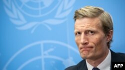 FILE - Carl Skau, at the time head of the Department for U.N. Policy, Conflict and Humanitarian Affairs, now deputy executive director and chief operating officer for the U.N. World Food Program, looks on during a press conference in Geneva, Feb. 27, 2023.