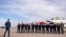FILE - President Joe Biden greats a group of Thunderbird pilots after arriving at Peterson Space Force Base in Colorado Springs, Colorado, May 31, 2023. Biden has decided to keep U.S. Space Command headquarters in Colorado.
