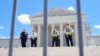Supreme Court Police officers stand outside the Supreme Court, in Washington, July 1, 2024.