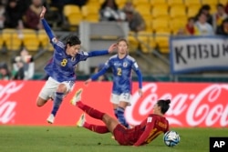 Japan's Hikaru Naomoto, left, and Spain's Jennifer Hermoso vie for the ball during the Women's World Cup Group C soccer match between Japan and Spain in Wellington, July 31, 2023.