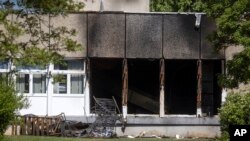 Remnants of a fire on the front of a refugee shelter in Apolda, Germany,June 4, 2023. 