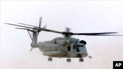 A U.S. Marine Corps CH-53E Super Stallion helicopter is seen in flight in this 2003 photo.
