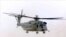 A U.S. Marine Corps CH-53E Super Stallion helicopter is seen in flight in this 2003 photo.