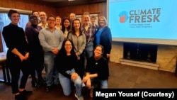 A group, including Megan Yousef (far left) and Debra Rosenthal (kneeling, center) participated in a Climate Fresk in Cleveland, Ohio.