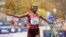 FILE - Sharon Lokedi, of Kenya, crosses the finish line first in the women's division of the New York City Marathon, Nov. 6, 2022, in New York. 
