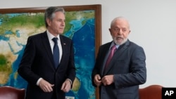 Brazil's President Luiz Inacio Lula da Silva, right, speaks with U.S. Secretary of State Antony Blinken, during a meeting at Planalto presidential palace, in Brasilia, Brazil, Feb. 21, 2024.