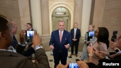 U.S. House Speaker Kevin McCarthy, R-Calif., speaks with reporters as the deadline to avert a partial government shutdown approaches on Capitol Hill in Washington, Sept. 28, 2023.